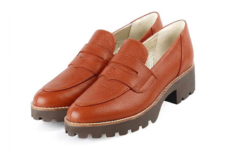 Step out in modern chunky loafers featuring durable lug soles, offering lightweight support, extra grip and bold everyday style, in terracotta leather with round toe and chunky rubber lug sole